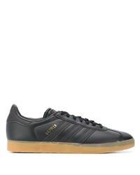 Baskets basses en cuir noires adidas