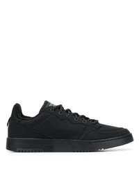 Baskets basses en cuir noires adidas