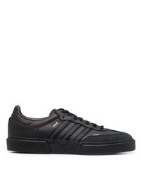 Baskets basses en cuir noires adidas