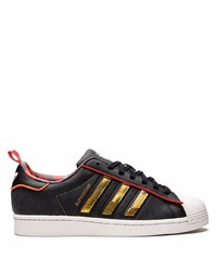 Baskets basses en cuir noires adidas