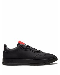 Baskets basses en cuir noires adidas