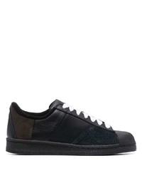 Baskets basses en cuir noires adidas