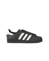 Baskets basses en cuir noires adidas