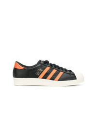 Baskets basses en cuir noires adidas