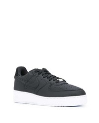 Baskets basses en cuir noires Nike