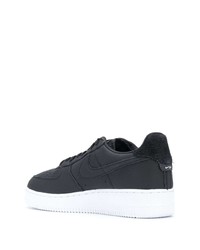 Baskets basses en cuir noires Nike