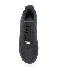 Baskets basses en cuir noires Nike