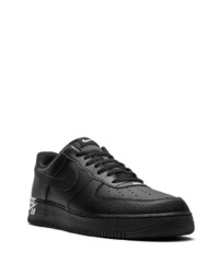 Baskets basses en cuir noires Nike