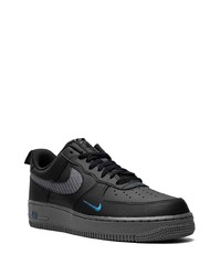 Baskets basses en cuir noires Nike