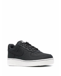 Baskets basses en cuir noires Nike