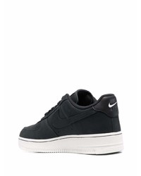 Baskets basses en cuir noires Nike