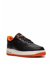 Baskets basses en cuir noires Nike