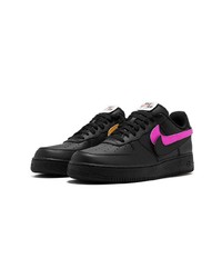 Baskets basses en cuir noires Nike