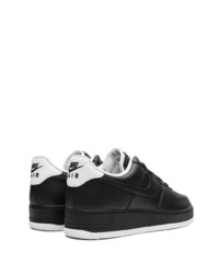 Baskets basses en cuir noires Nike