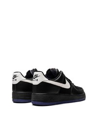 Baskets basses en cuir noires Nike