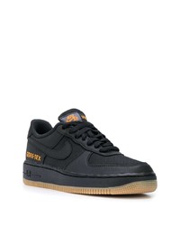 Baskets basses en cuir noires Nike