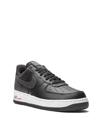 Baskets basses en cuir noires Nike