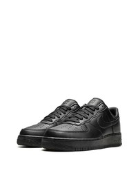 Baskets basses en cuir noires Nike