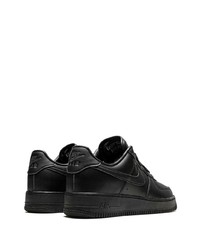 Baskets basses en cuir noires Nike