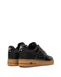 Baskets basses en cuir noires Nike