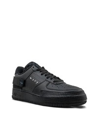 Baskets basses en cuir noires Nike