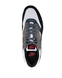 Baskets basses en cuir noires Nike