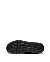 Baskets basses en cuir noires Nike