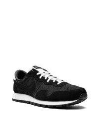 Baskets basses en cuir noires Nike