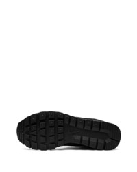 Baskets basses en cuir noires Nike