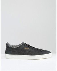 Baskets basses en cuir noires Puma