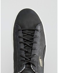 Baskets basses en cuir noires Puma