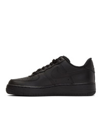 Baskets basses en cuir noires Nike