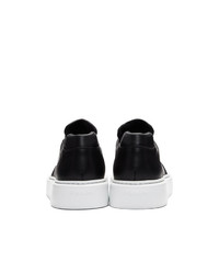 Baskets basses en cuir noires Prada