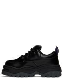 Baskets basses en cuir noires Eytys