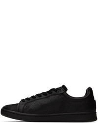 Baskets basses en cuir noires Lacoste