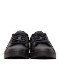 Baskets basses en cuir noires Converse