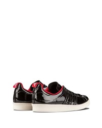 Baskets basses en cuir noires adidas