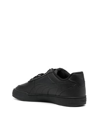 Baskets basses en cuir noires Puma