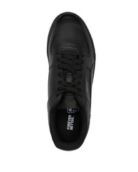 Baskets basses en cuir noires Puma