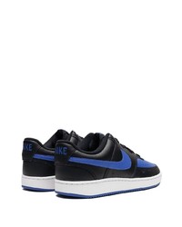 Baskets basses en cuir noires Nike