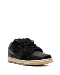 Baskets basses en cuir noires Nike