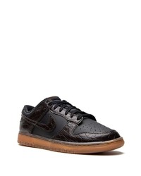 Baskets basses en cuir noires Nike