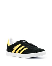 Baskets basses en cuir noires adidas