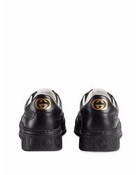 Baskets basses en cuir noires Gucci