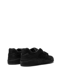 Baskets basses en cuir noires Nike