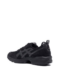 Baskets basses en cuir noires Asics