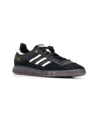 Baskets basses en cuir noires adidas