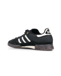 Baskets basses en cuir noires adidas