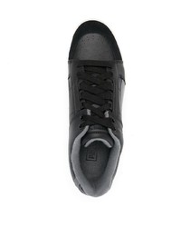 Baskets basses en cuir noires Puma