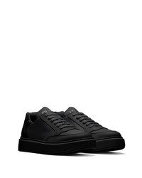 Baskets basses en cuir noires Prada